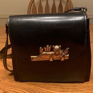 Sasha Vintage Black Leather shoulder Bag with Gold Tiger front Accent Like NEW